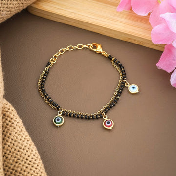 Trendy Gold-Toned Evil Eye Charm Bracelet with Black Beads for Women