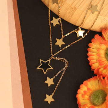 Layered Gold Star Necklace with Black Enamel