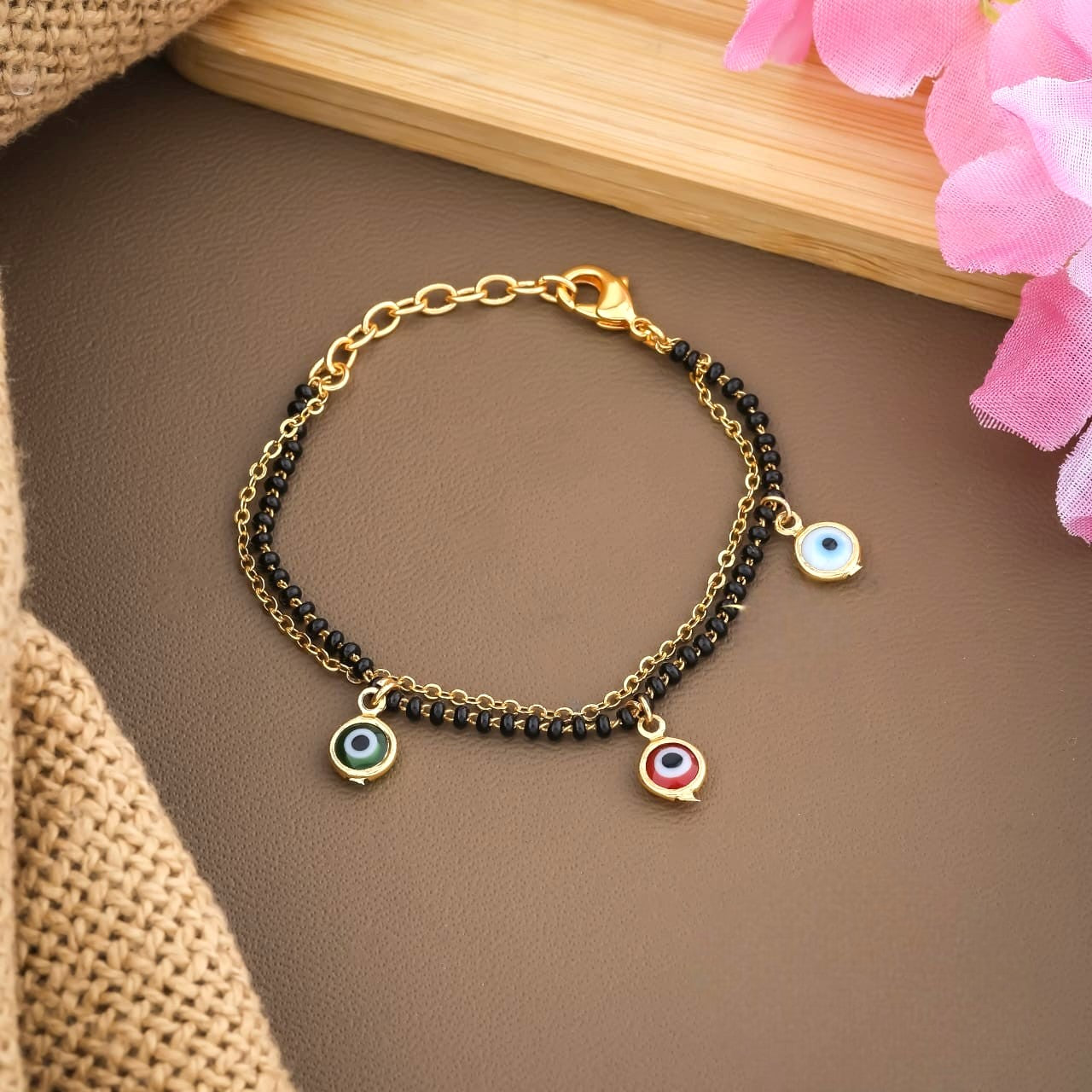 Trendy Gold-Toned Evil Eye Charm Bracelet with Black Beads for Women