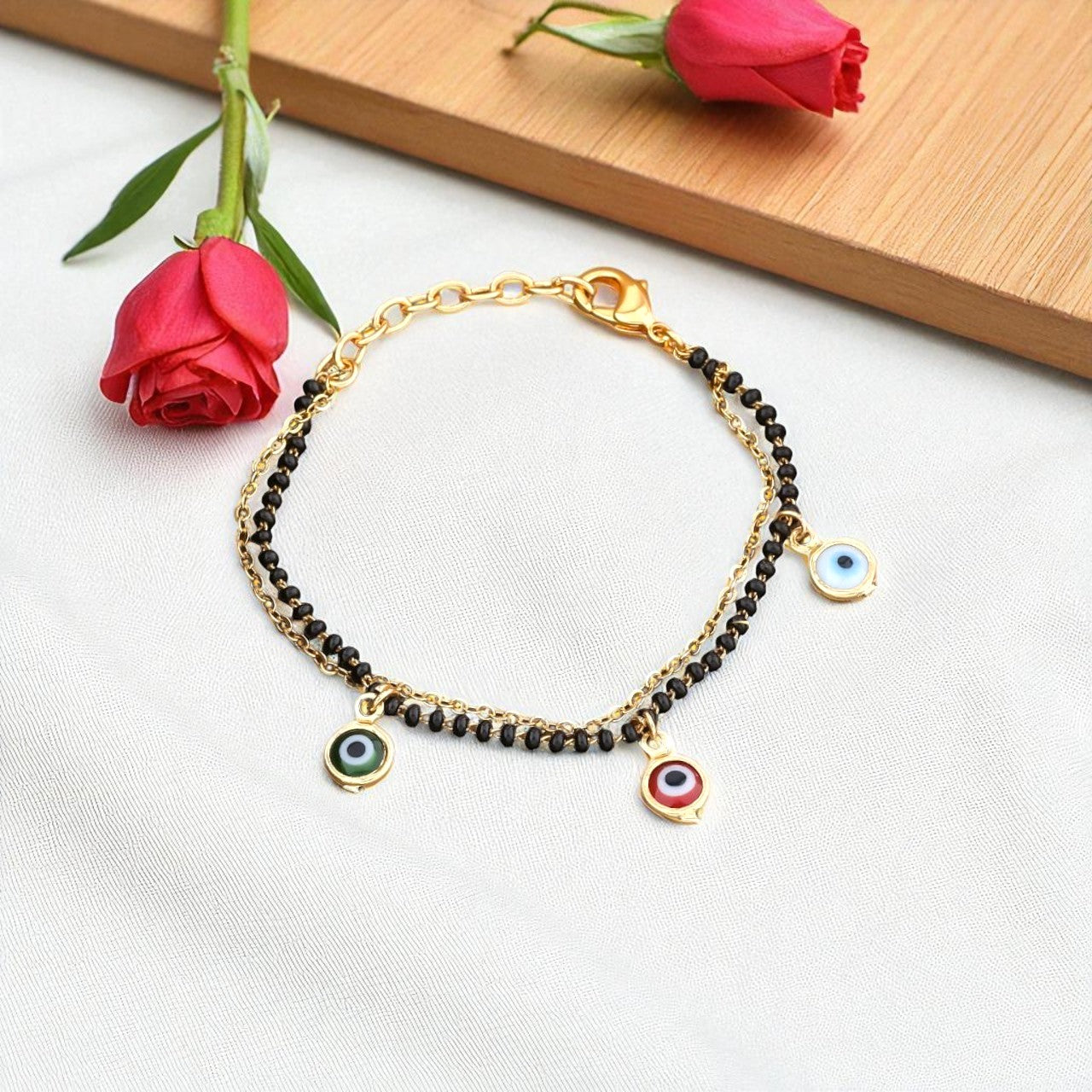 Trendy Gold-Toned Evil Eye Charm Bracelet with Black Beads for Women