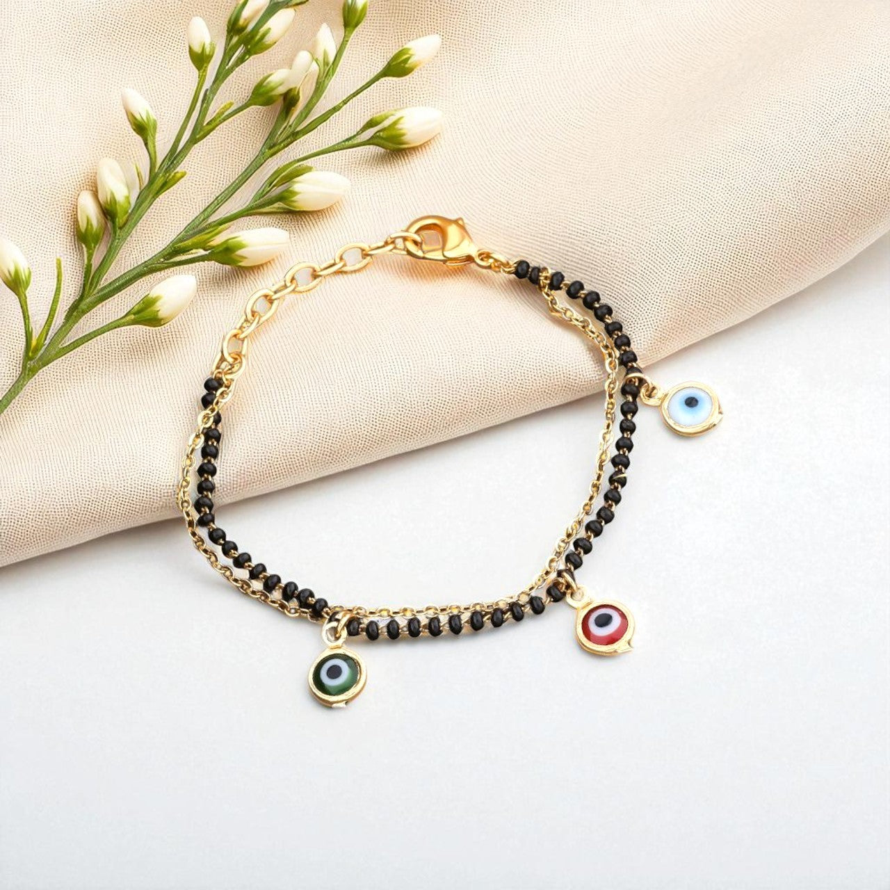 Trendy Gold-Toned Evil Eye Charm Bracelet with Black Beads for Women